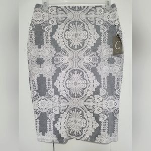 NWT Bodycon Jersey Material Midi Skirt with Embossed White Lace Print